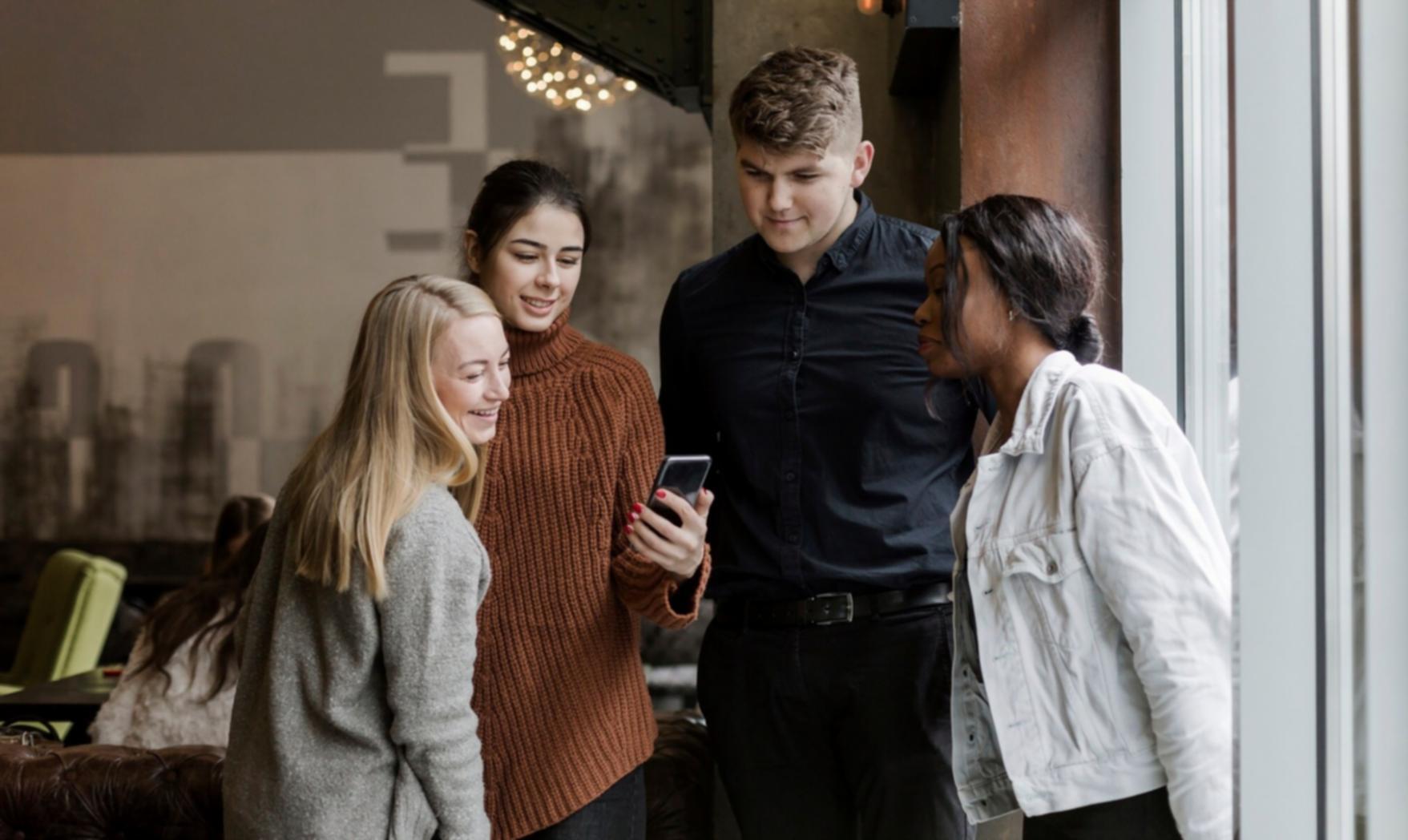 Students collaborating on investment analysis projects